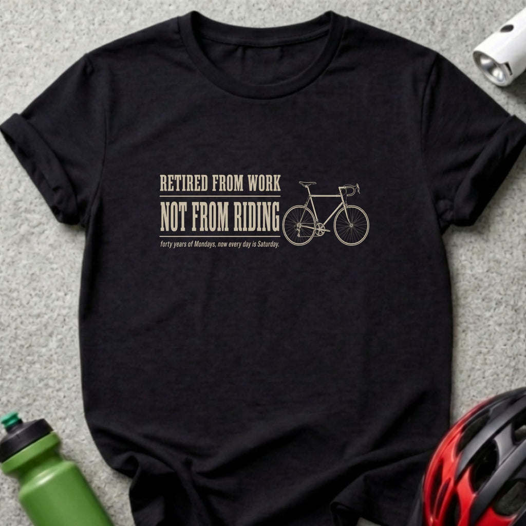 Black t-shirt with "Retired From Work Not From Riding" text and bicycle graphic.