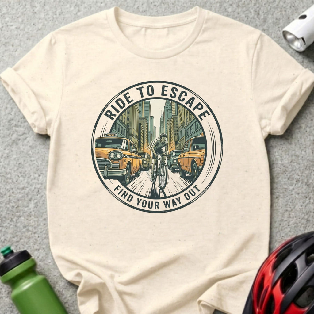 Circular graphic on t-shirt: "Ride to Escape, Find Your Way Out" with cyclist on city street.