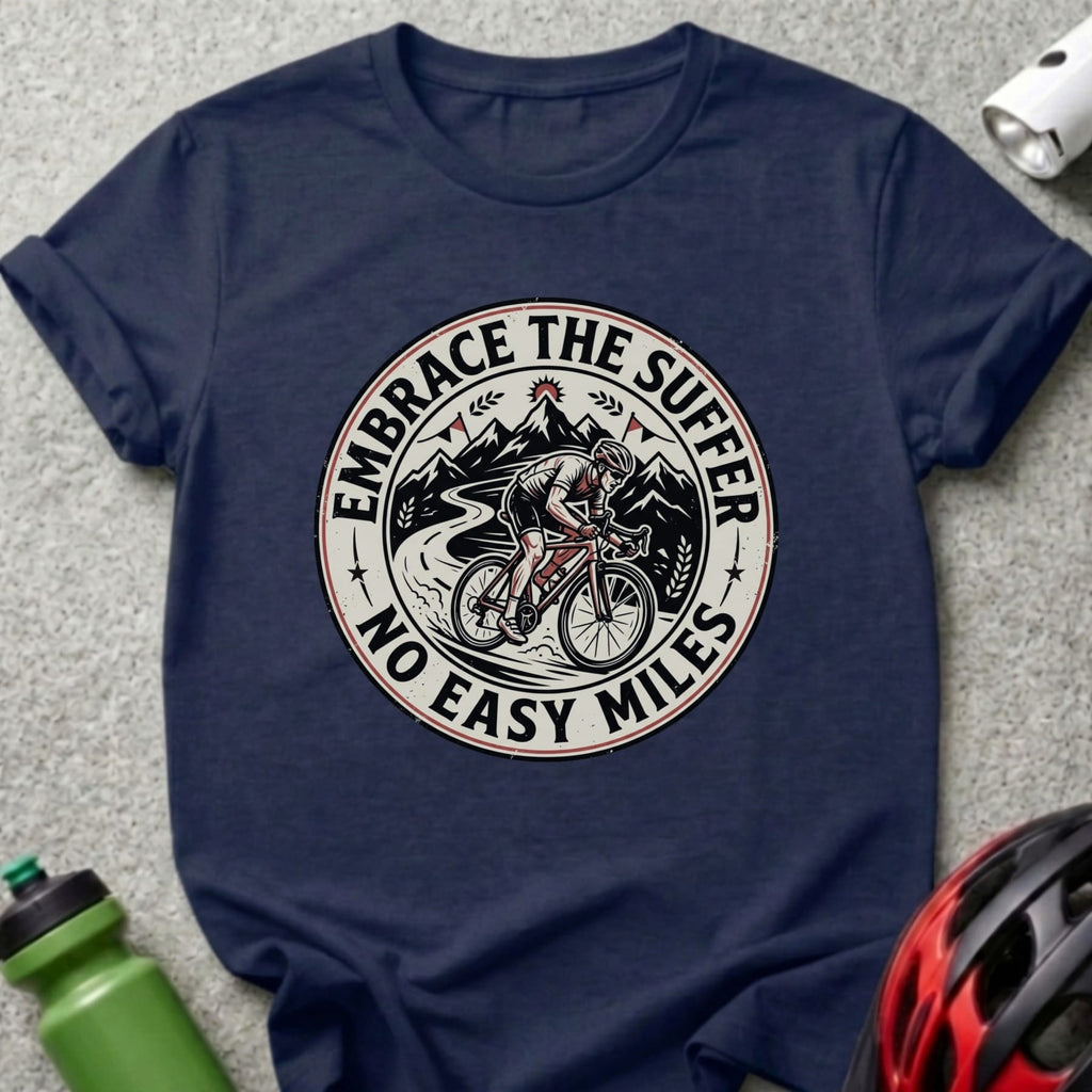 T-shirt with circular graphic of cyclist on mountain road, "Embrace the Suffer, No Easy Miles".