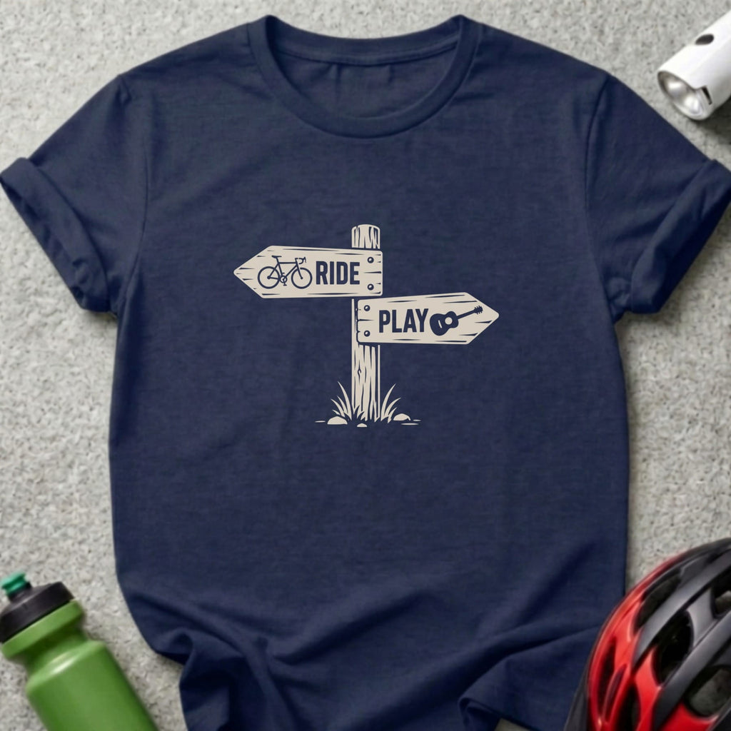 Dark blue t-shirt featuring a wooden sign graphic with text reading RIDE and PLAY.