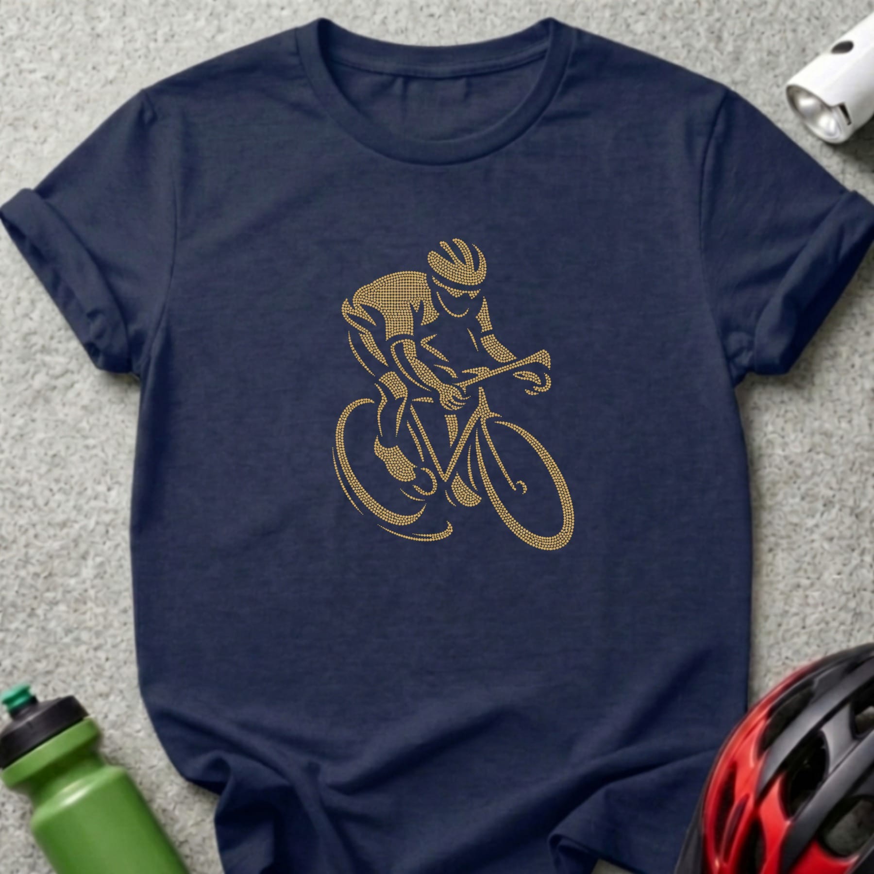 Navy t-shirt with gold dotted cyclist graphic and cyclist helmet and water bottle.