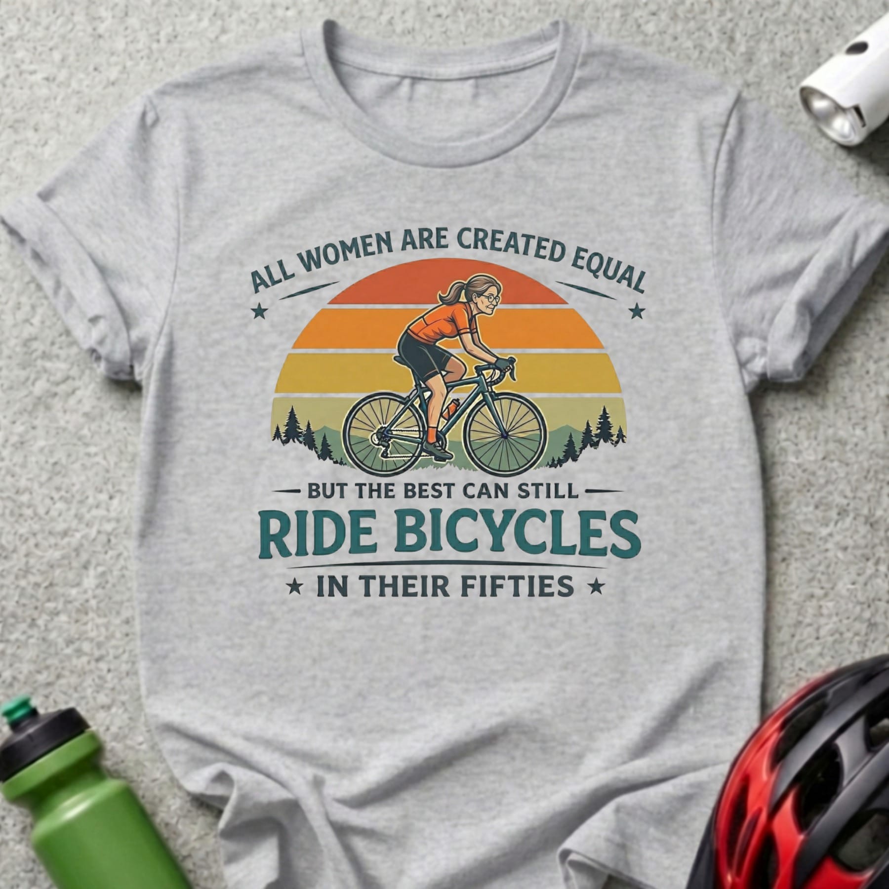 Graphic tee with text "All women are created equal but the best can still ride bicycles in their fifties."