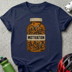 T-shirt graphic: bottle labeled "Motivation" filled with bicycles.