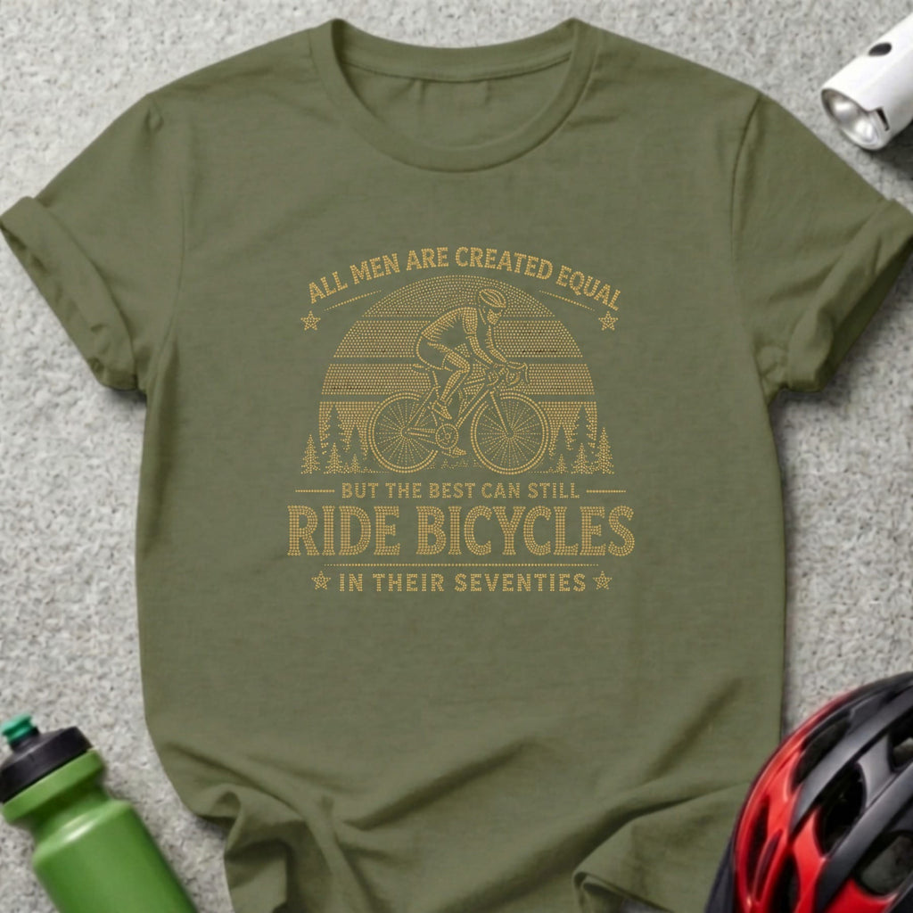 Olive t-shirt with graphic "All men are created equal but the best can still ride bicycles in their seventies".