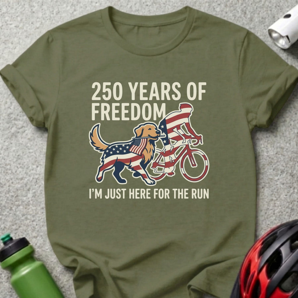 Green t-shirt with "250 Years of Freedom" and dog with flag cycling.