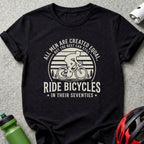 Black t-shirt with "All men are created equal but the best can still ride bicycles in their seventies" text.