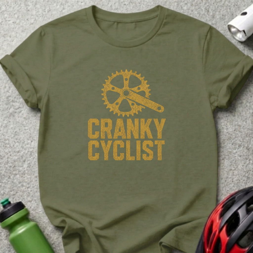 Green t-shirt with a gold bicycle crankset and the text "CRANKY CYCLIST".