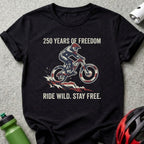 Black t-shirt with cyclist graphic and text: 250 YEARS OF FREEDOM, RIDE WILD. STAY FREE.