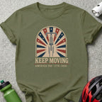 Green t-shirt with "Keep Moving America 250 - 1776 - 2026" text and bicycle wheel graphic.