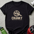 Black t-shirt with crank graphic and text "CRANKY EVEN IN THE AFTERLIFE."
