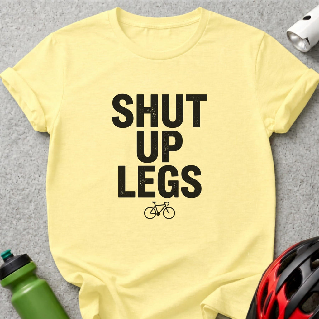 Yellow t-shirt with "SHUT UP LEGS" and bicycle graphic.