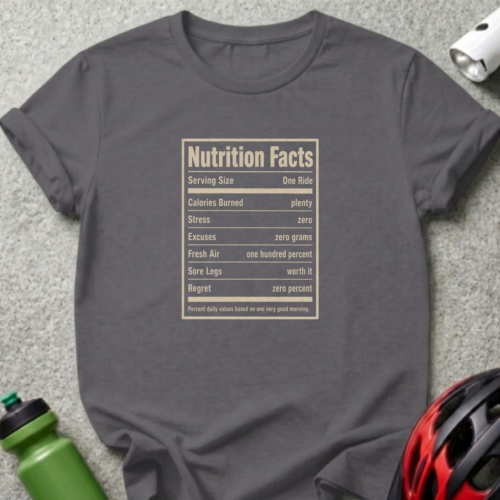 Gray t-shirt with "Nutrition Facts" listing serving size, calories, stress, excuses, fresh air, sore legs, and regret.