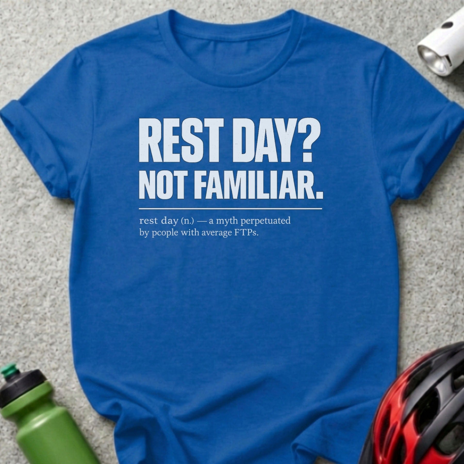 Blue t-shirt with "REST DAY? NOT FAMILIAR." and definition text.