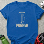 A blue t-shirt featuring a graphic of a bicycle pump and the text PUMPED.