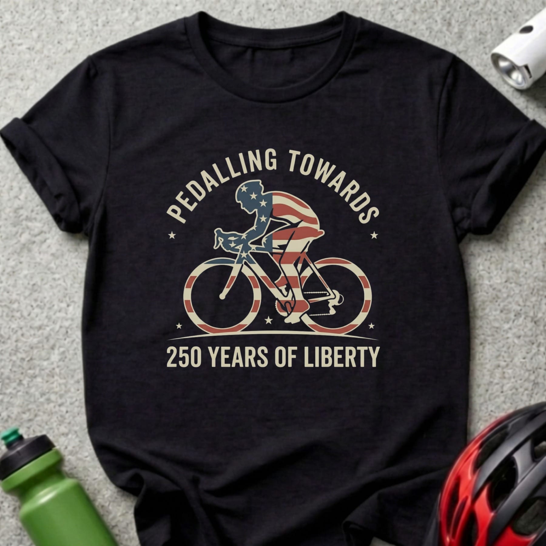 Black t-shirt with cyclist graphic, "Pedalling Towards 250 Years of Liberty".