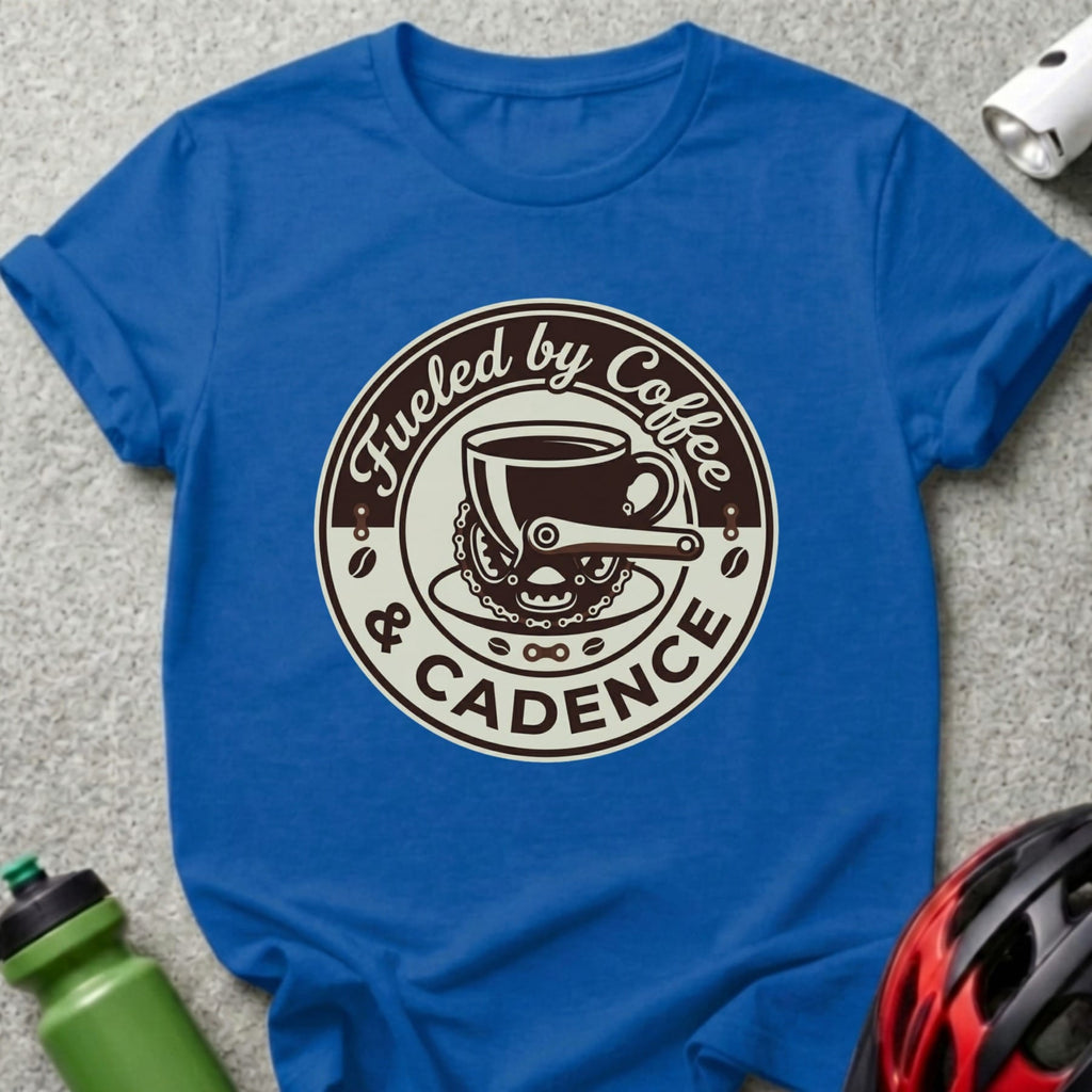 Royal blue t-shirt with "Fueled by Coffee & Cadence" circular logo featuring a coffee cup and bicycle chain.