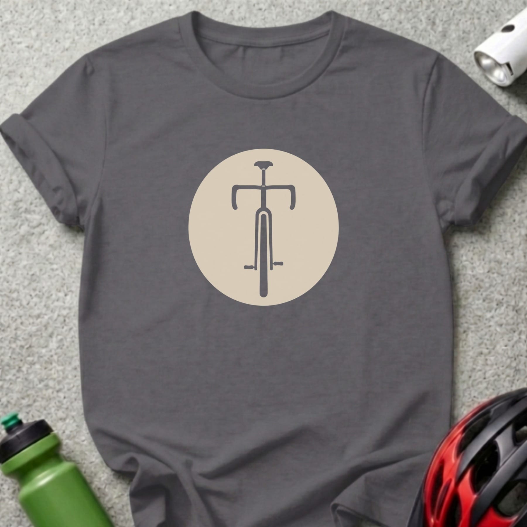 Dark grey t-shirt with a beige circle containing a stylized bicycle silhouette.