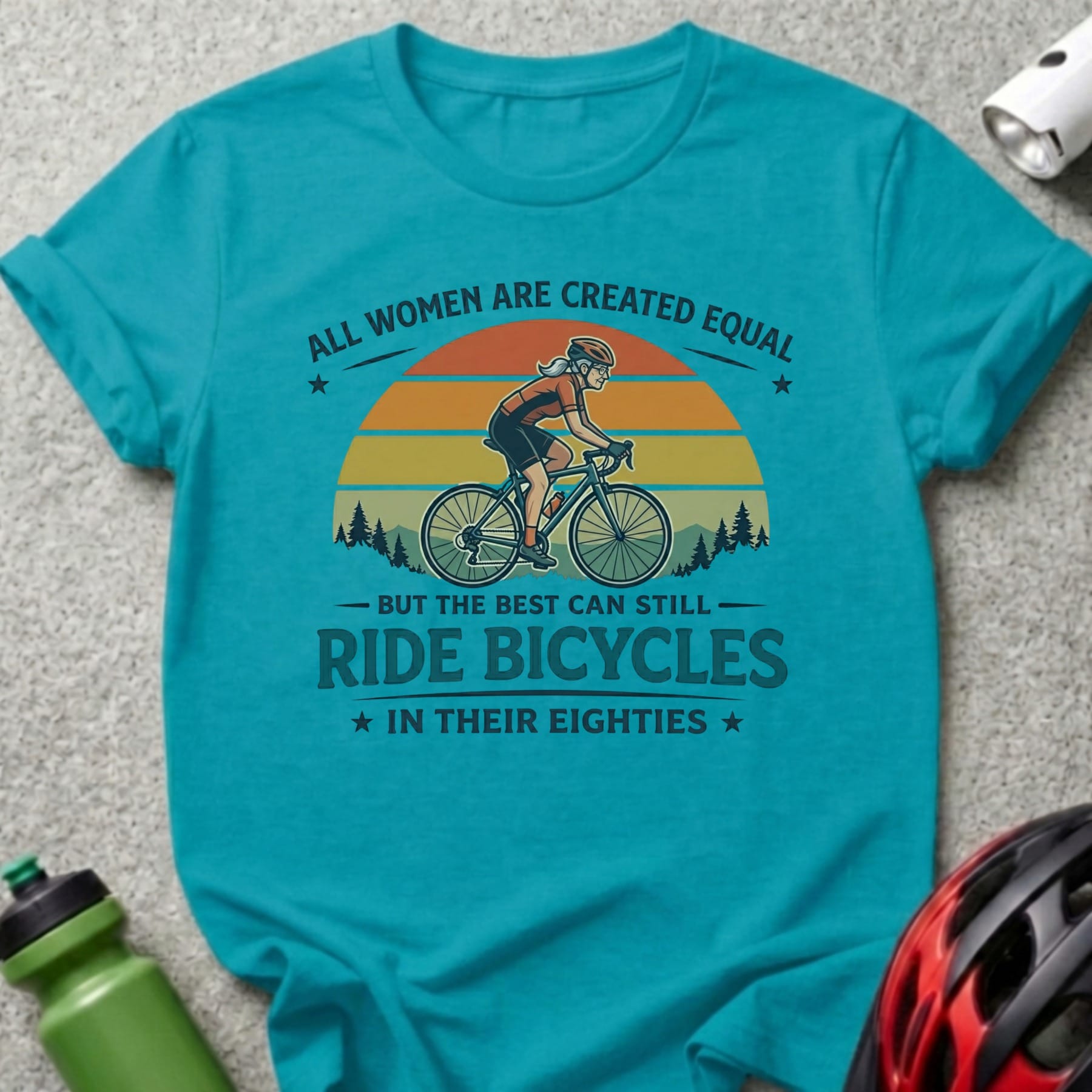 T-shirt with text "All women are created equal, but the best can still ride bicycles in their eighties".