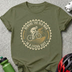 Olive green t-shirt with "Beware the old man in a lycra suit" cycling graphic.