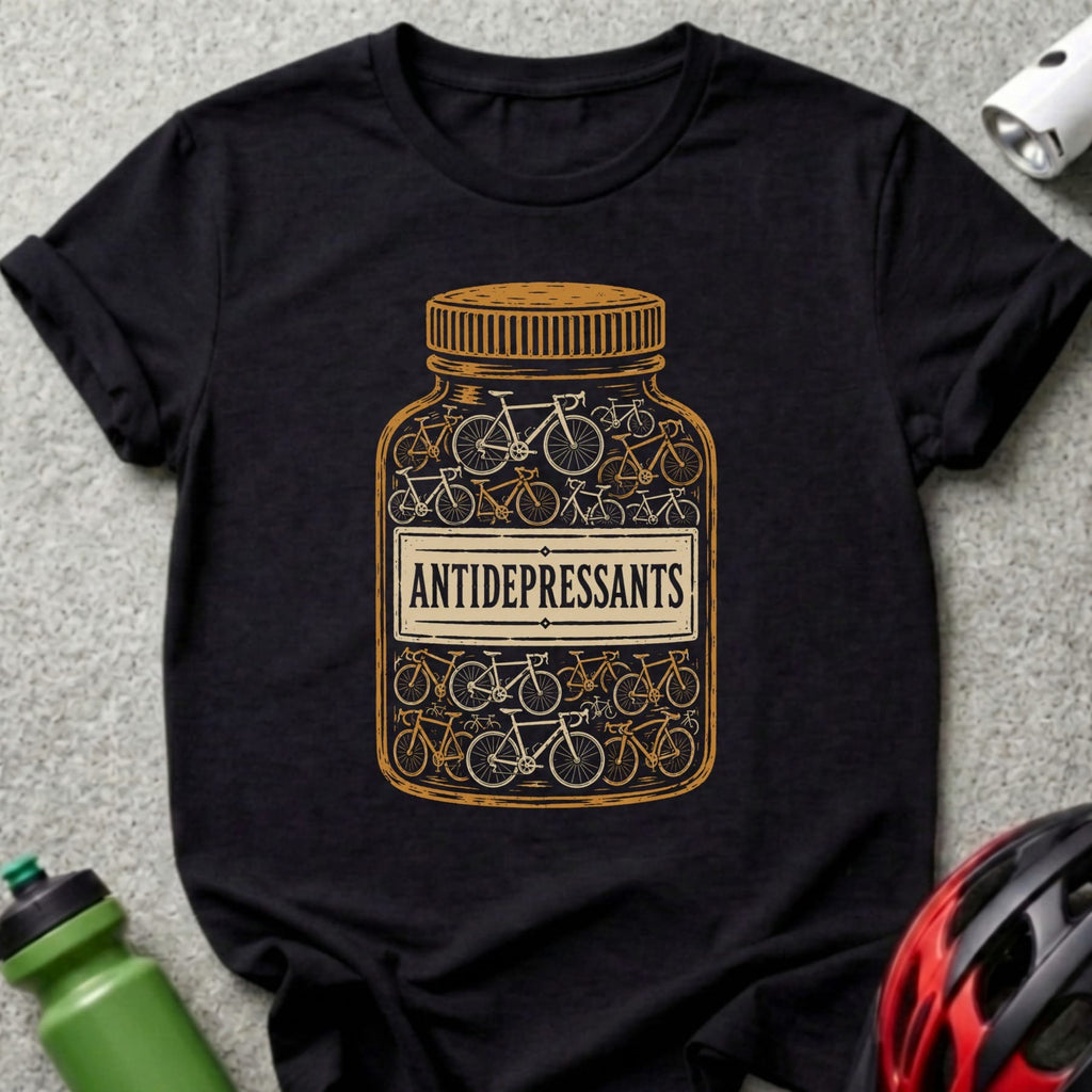 Black t-shirt with a pill bottle graphic filled with bicycles, labeled "ANTIDEPRESSANTS".