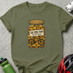 Green t-shirt with a graphic of a jar filled with coins and a bicycle, labeled "The Bike Fund do not touch".