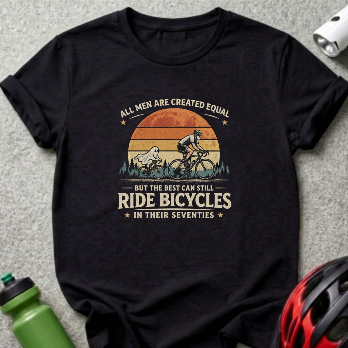 Black t-shirt with graphic: "All men are created equal, but the best can still ride bicycles in their seventies."