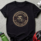 Black t-shirt with a distressed graphic of a cyclist and the text "GRANDPA'S BIKE IS FASTER THAN YOURS".