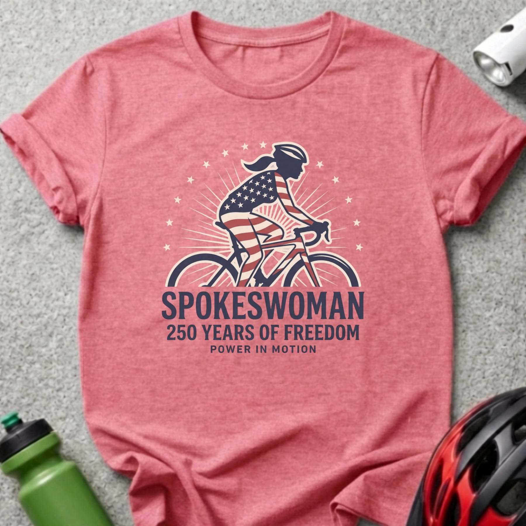 T-shirt with "Spokeswoman 250 Years of Freedom Power in Motion" text and cyclist graphic.