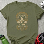 Olive green t-shirt with "ROOTED IN THE RIDE" text and bicycle tree graphic.