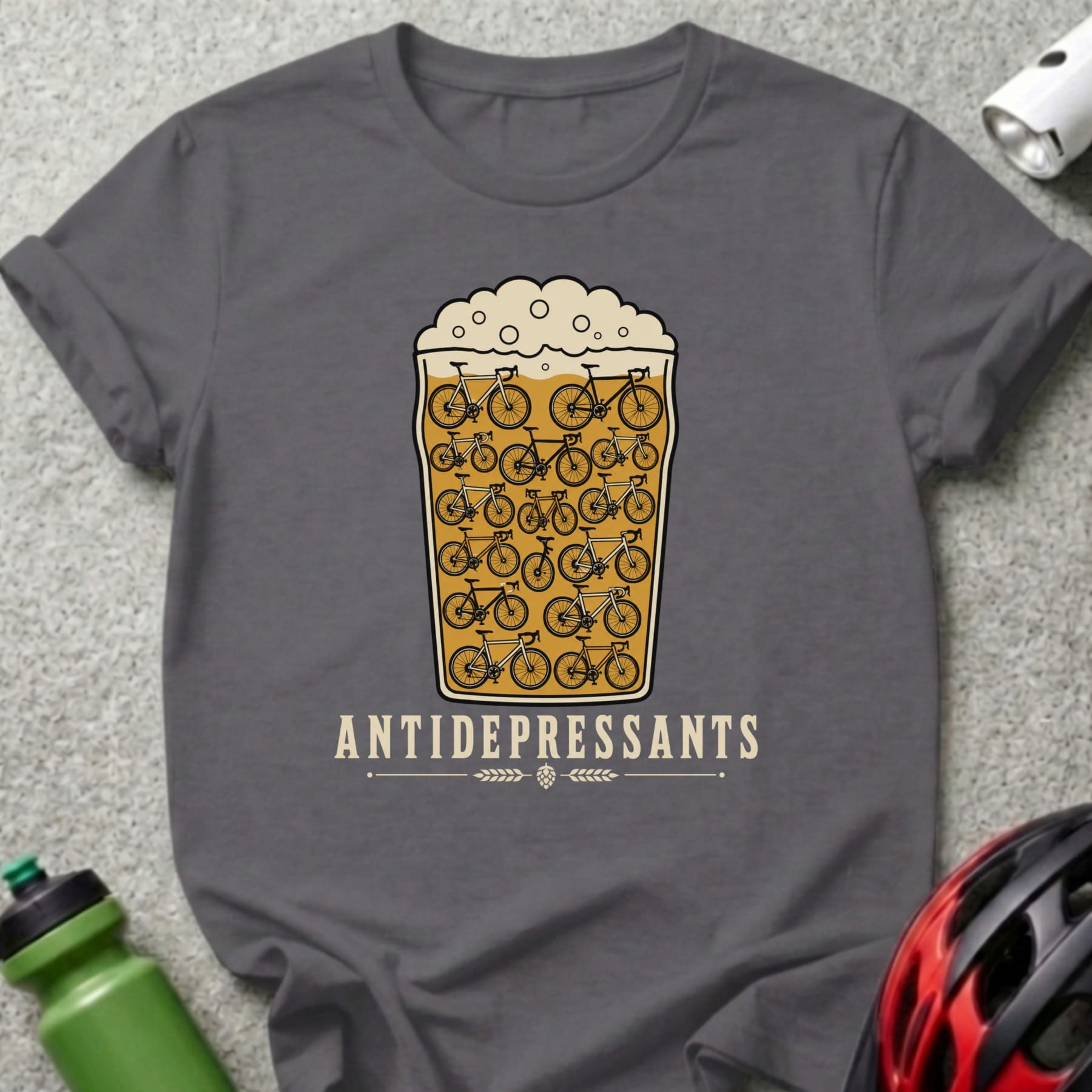 T-shirt graphic of a beer glass filled with bicycles, text "ANTIDEPRESSANTS".