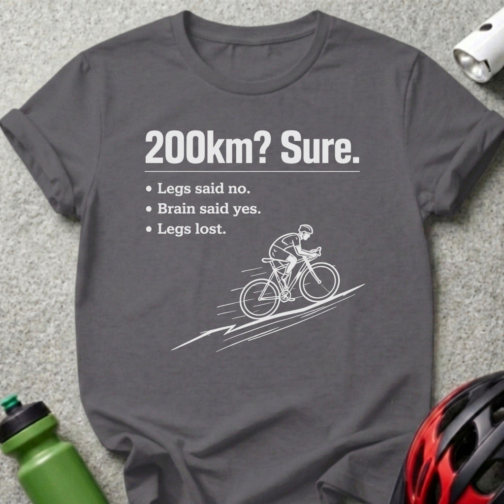 T-shirt with cyclist graphic and text "200km? Sure. Legs said no. Brain said yes. Legs lost."