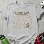Gray t-shirt with "I'M NOT LOST - I'M EXPLORING" and a cyclist on a map.