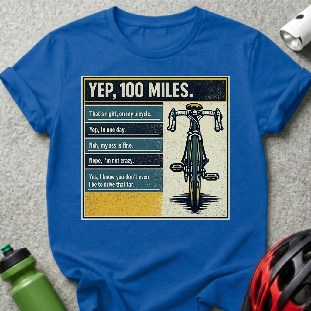 Blue t-shirt with bicycle graphic and humorous text about cycling 100 miles.