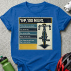 Blue t-shirt with bicycle graphic and humorous text about cycling 100 miles.