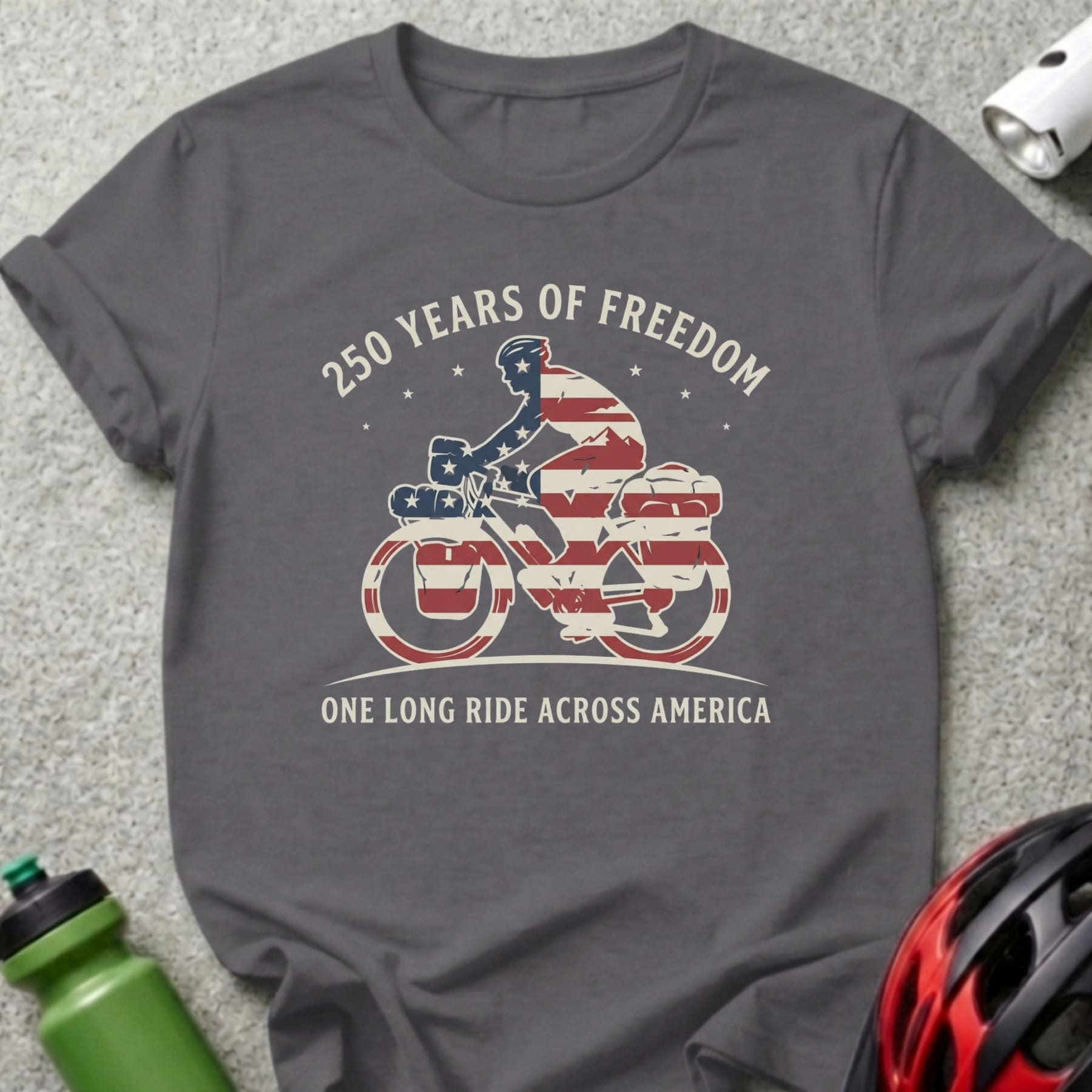 Gray t-shirt with "250 Years of Freedom One Long Ride Across America" text and bicyclist graphic.