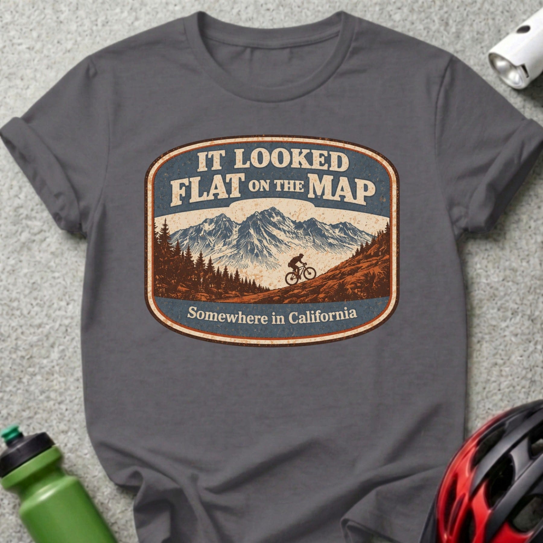 T-shirt with vintage mountain biking graphic, "It Looked Flat on the Map Somewhere in California."