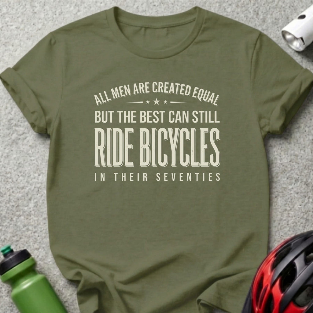 Olive green t-shirt with text "All men are created equal but the best can still ride bicycles in their seventies".