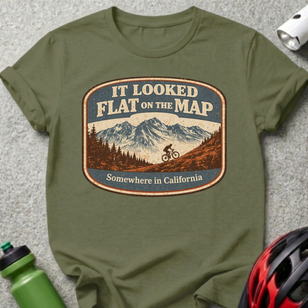 T-shirt graphic with mountainous landscape and biker, reads "It Looked Flat on the Map. Somewhere in California."