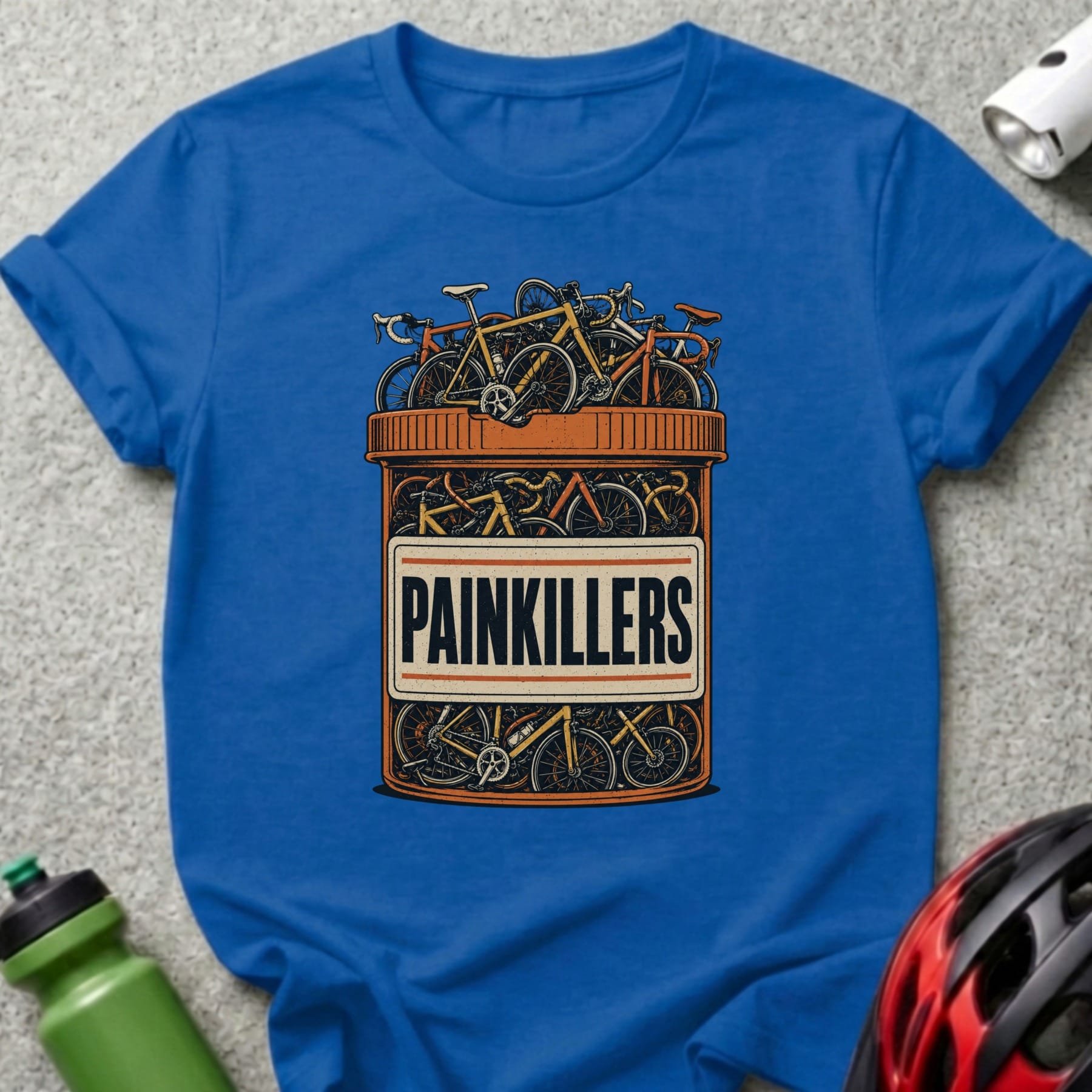 T-shirt graphic of bicycles in a pill bottle labeled "PAINKILLERS".