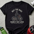 Black t-shirt with "BUY THE BIKE FIGURE IT OUT" text and cyclist graphic.
