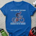 Blue t-shirt with cyclist graphic and text "250 YEARS OF FREEDOM RIDDEN WITH HONOR".