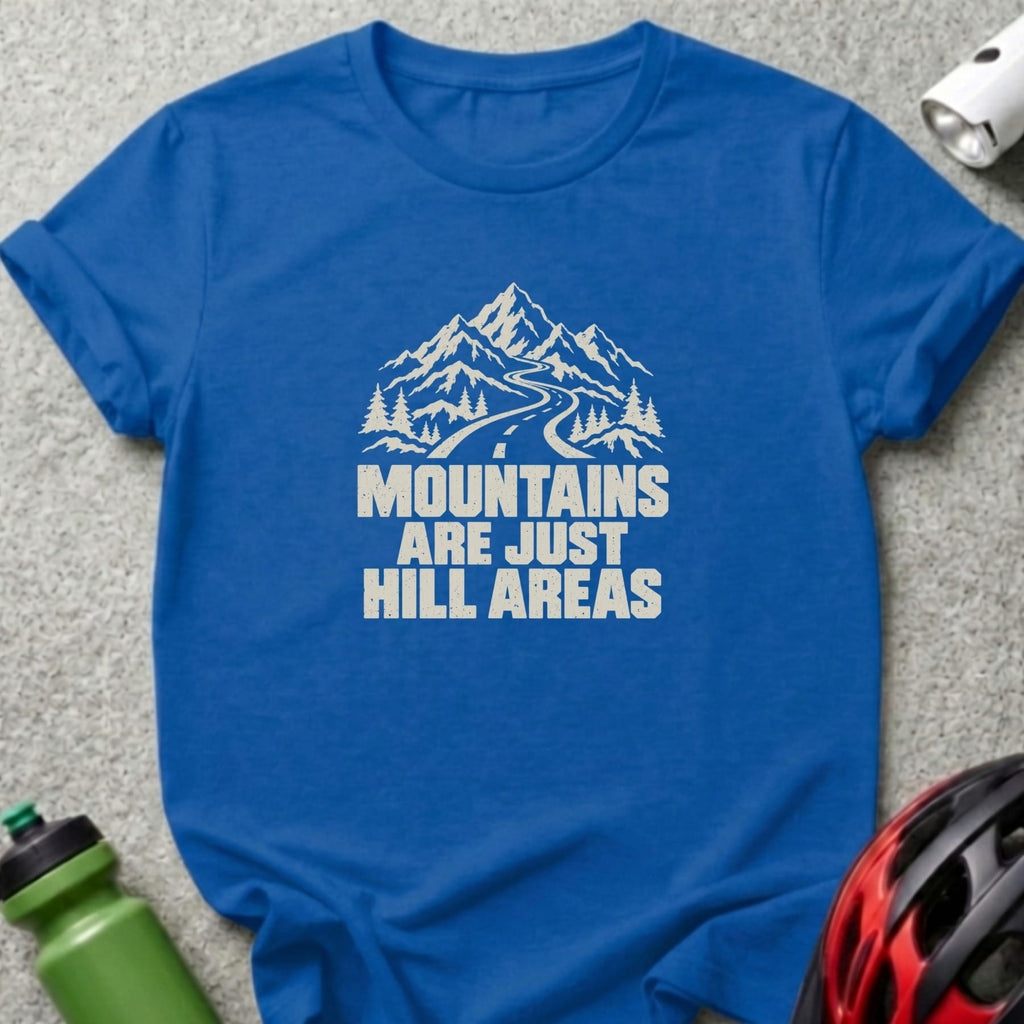 Royal blue t-shirt featuring white text that reads Mountains Are Just Hill Areas below a mountain graphic.