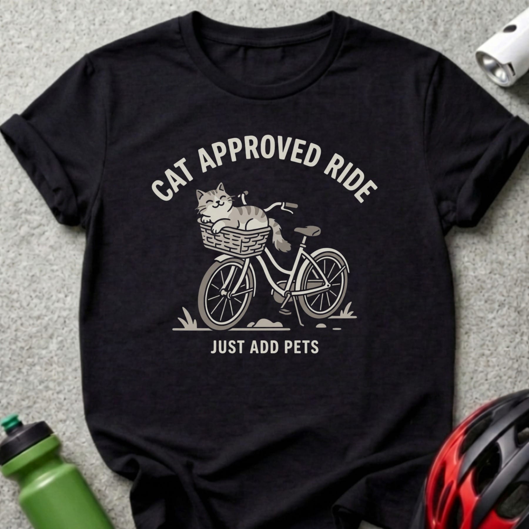 Black t-shirt with "CAT APPROVED RIDE JUST ADD PETS" and a cat in a bicycle basket.
