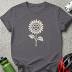 Dark gray t-shirt featuring a white graphic of a sunflower with a bicycle chainring center.