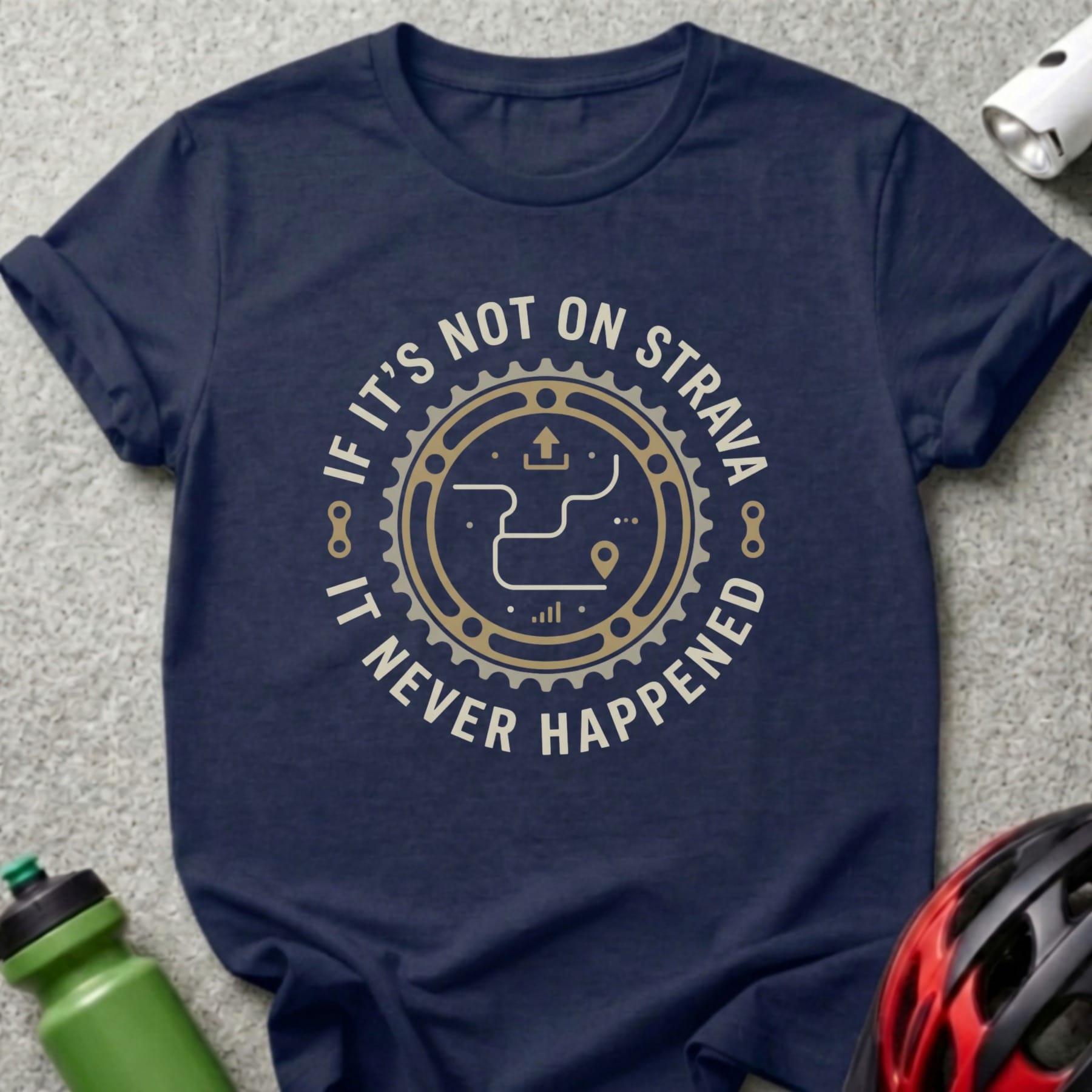 Navy t-shirt with "If it's not on Strava it never happened" circular graphic.