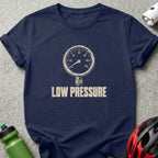 Dark blue crewneck t-shirt featuring a pressure gauge graphic and the text LOW PRESSURE.