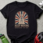 Black t-shirt with "Keep Moving" and American flag bicycle wheel design.