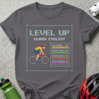 T-shirt with pixel art cyclist and stats: Level Up, Class: Cyclist, Max stats.