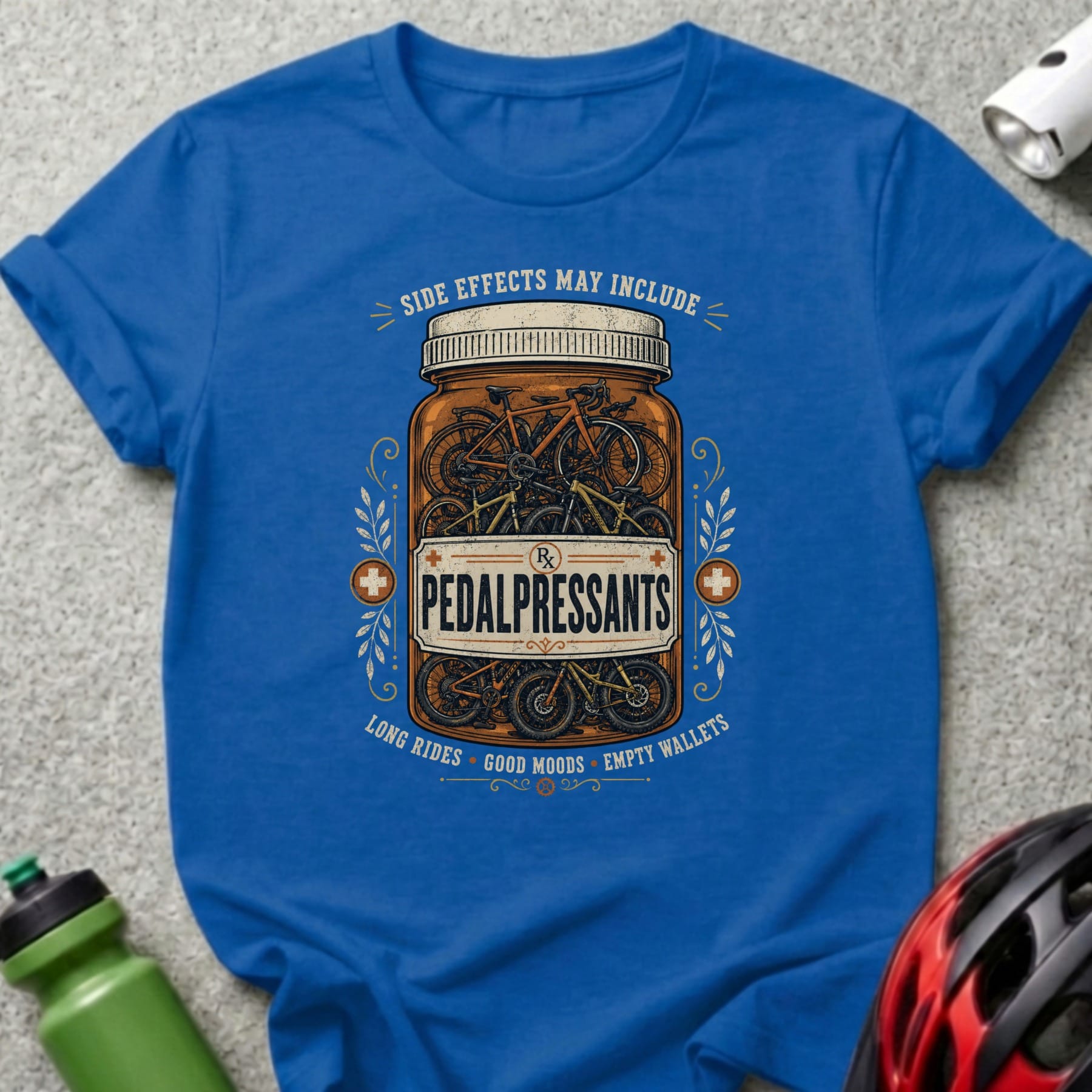 Royal blue t-shirt with "Pedalpressants" pill bottle design.