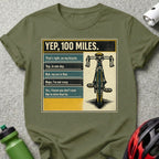 T-shirt with bicycle graphic and humorous text about riding 100 miles.